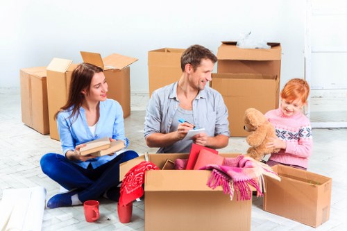 Professional office movers handling equipment
