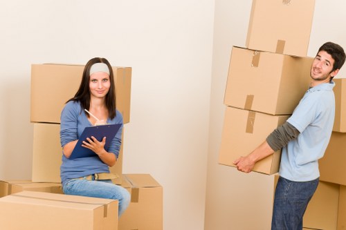 Experienced movers carefully packing and loading items for transport