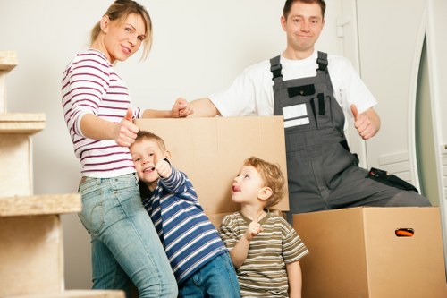 Satisfied customer receiving their belongings from Wandsworthon Man and Van